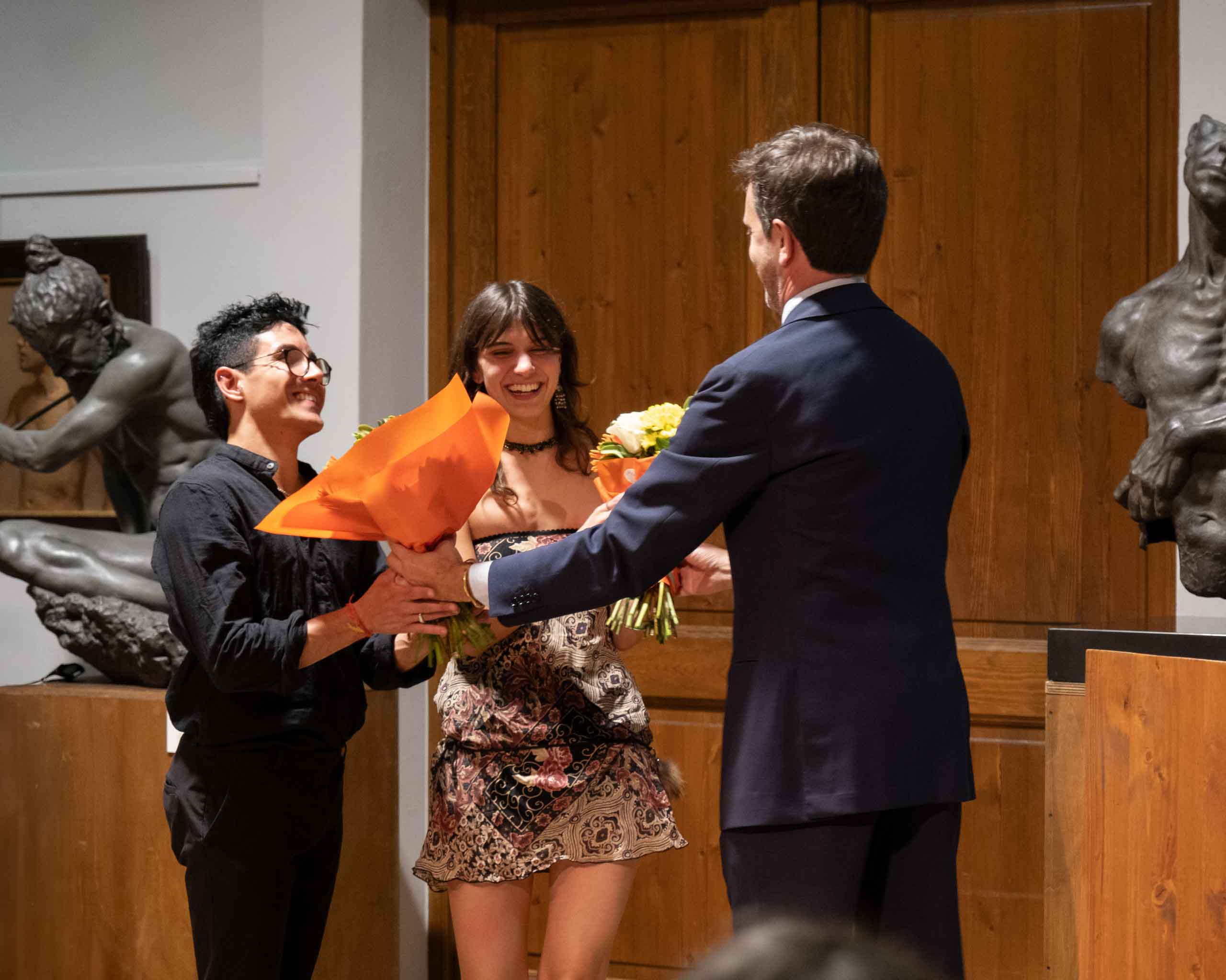 Amir and Diletta recieve flowers as a thank you to all models of the FAA