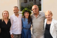 FAA Graduate Andrea Kirlieva with family after the ceremony FAA Graduate Andrea Kirlieva with family after the ceremony