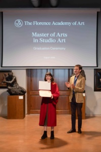 Katrina Smith receives the diploma