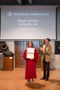 Lea Whatley receives the diploma